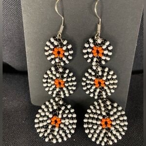 Maasai handcrafted dangle earrings made with contrasting glass seed beads. 2.5”